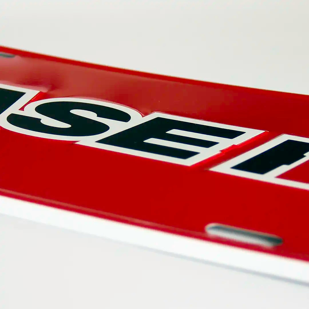 Case IH Red License Plate close up