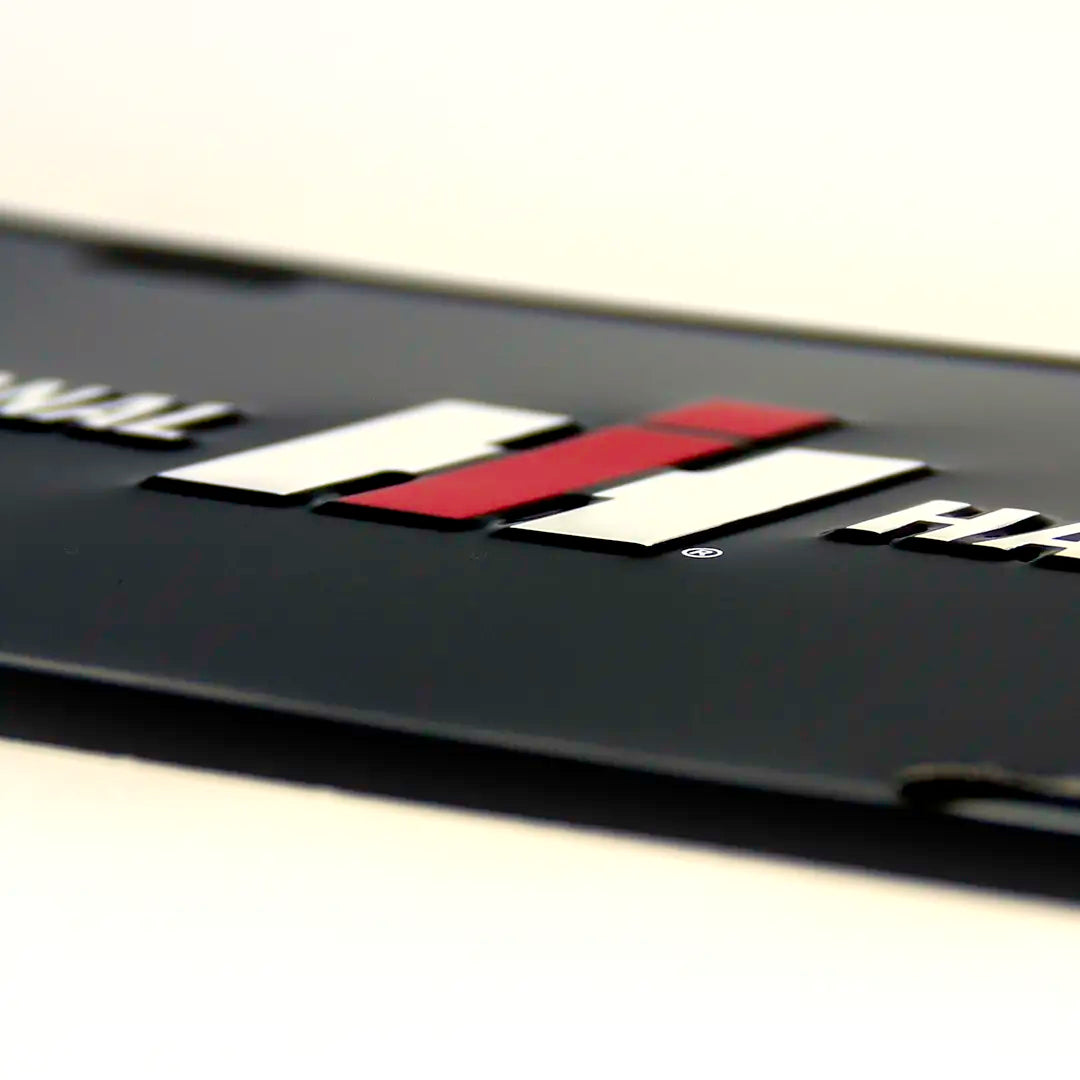 IH black logo license plate