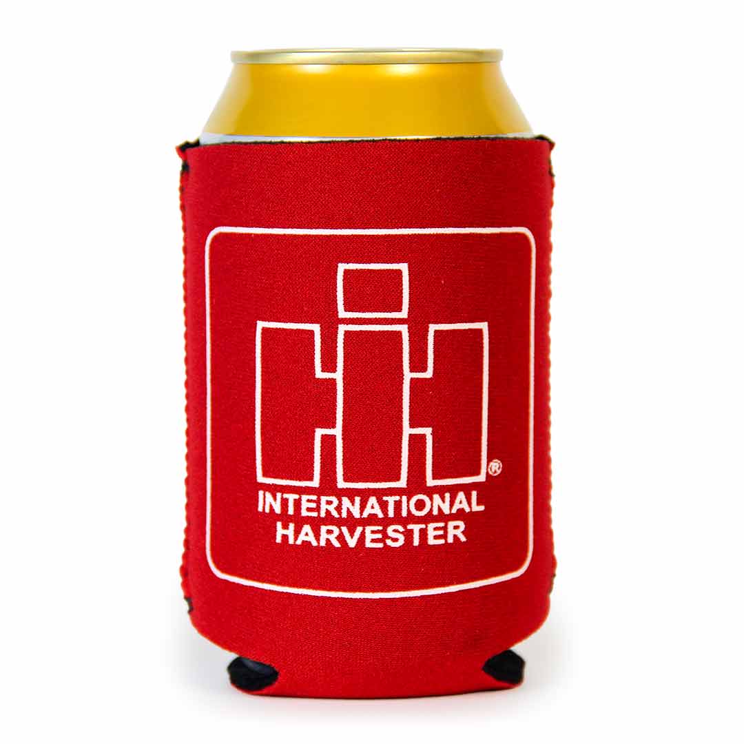IH outlined Logo Red Koozie standing with can