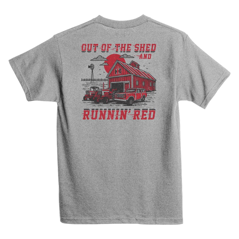 A gray t-shirt with a graphic print on the back featuring a red shed and the words 'OUT OF THE SHED AND RUNNIN RED'.
