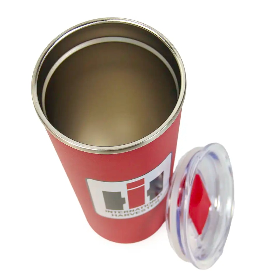 Red tumbler with International Harvester Logo and a silver lid on a white background