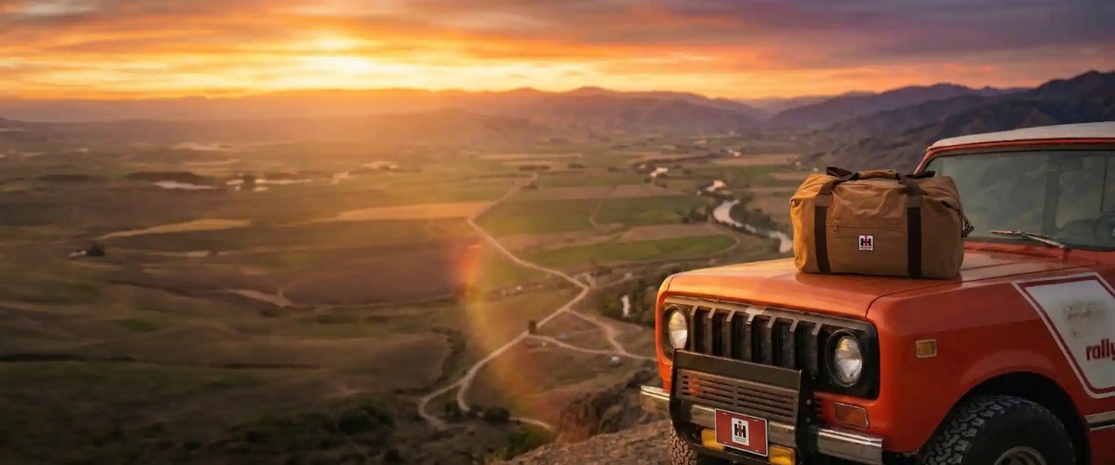 IH Weekend Warrior travel bag on hood of Scout II