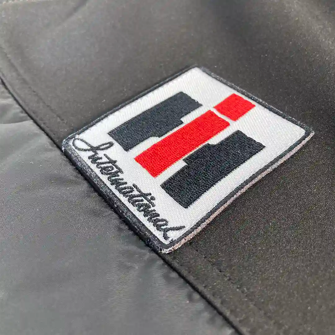 International Harvester logo patch on black IH Apex Vest